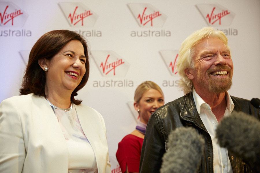 Sir Richard Branson teams up with Queensland Premier Annastacia Palaszczuk by unveiling a tech-heavy, comfort focused Virgin lounge at Brisbane Airport.