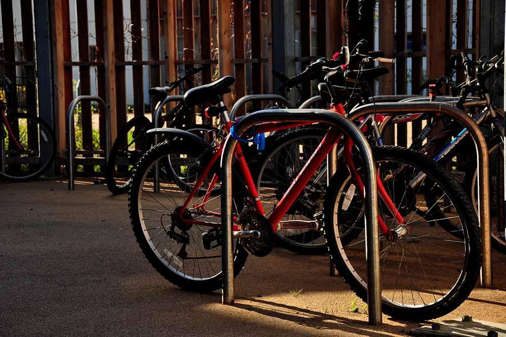 The NSW government will install bike storage sheds for cyclists to use at train stations in outer Sydney suburbs where the demand is high.